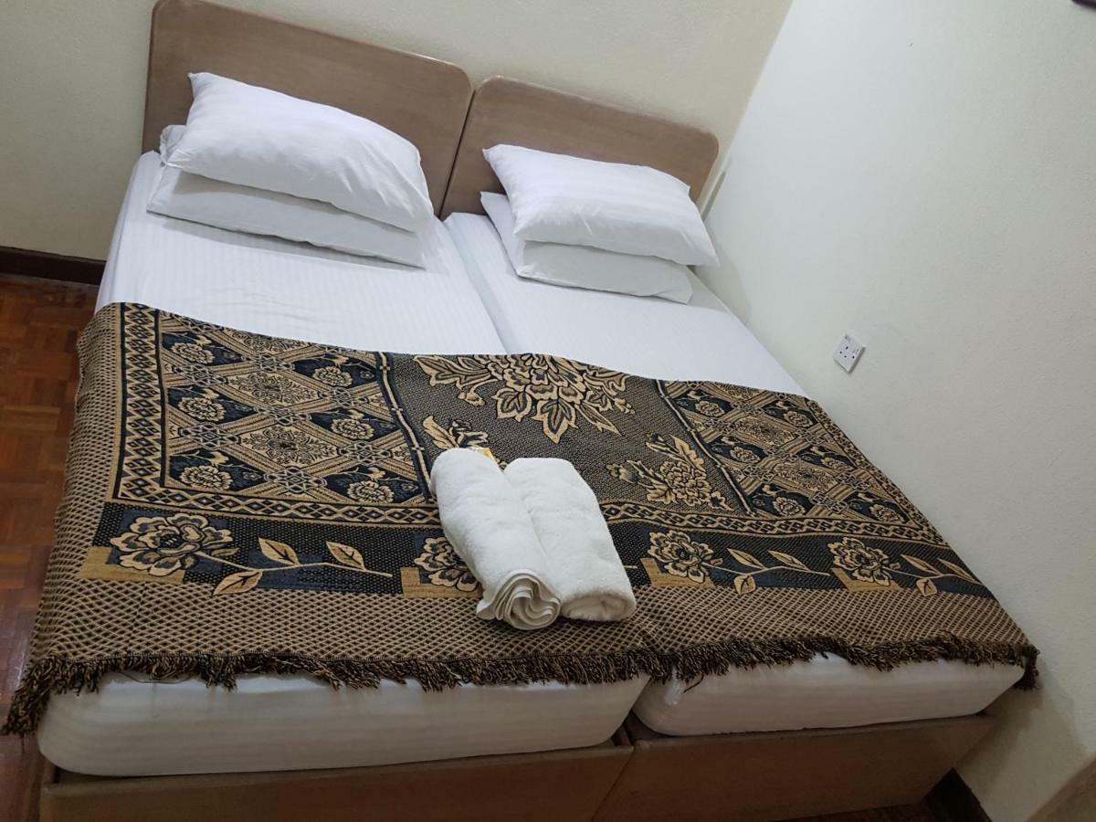 Home Stay Bayu Emas Appartment, Batu Feringgi Buitenkant foto
